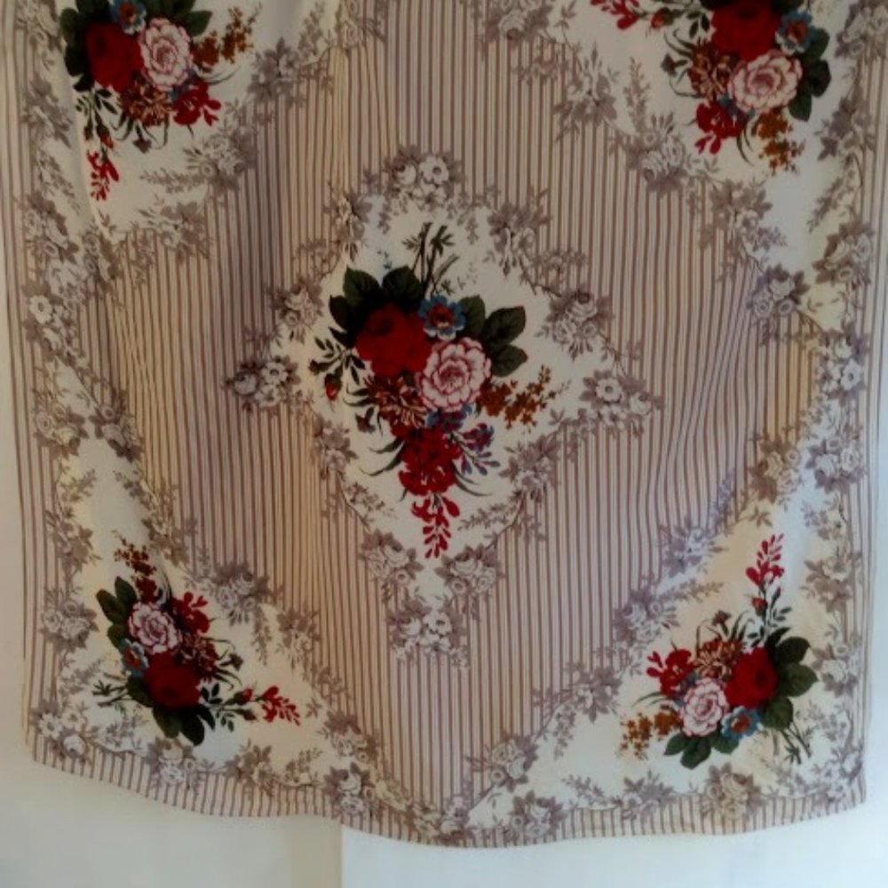 Club 7: Beautiful silk scarf with vibrant floral print.